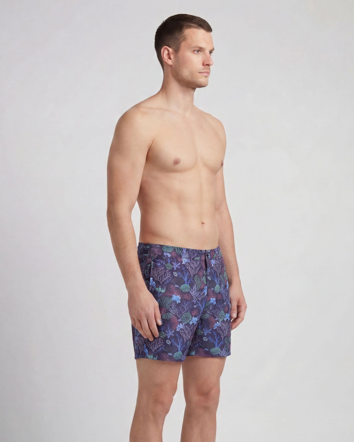 QUACK CORAL GARDEN SWIM SHORT IN PURPLE
