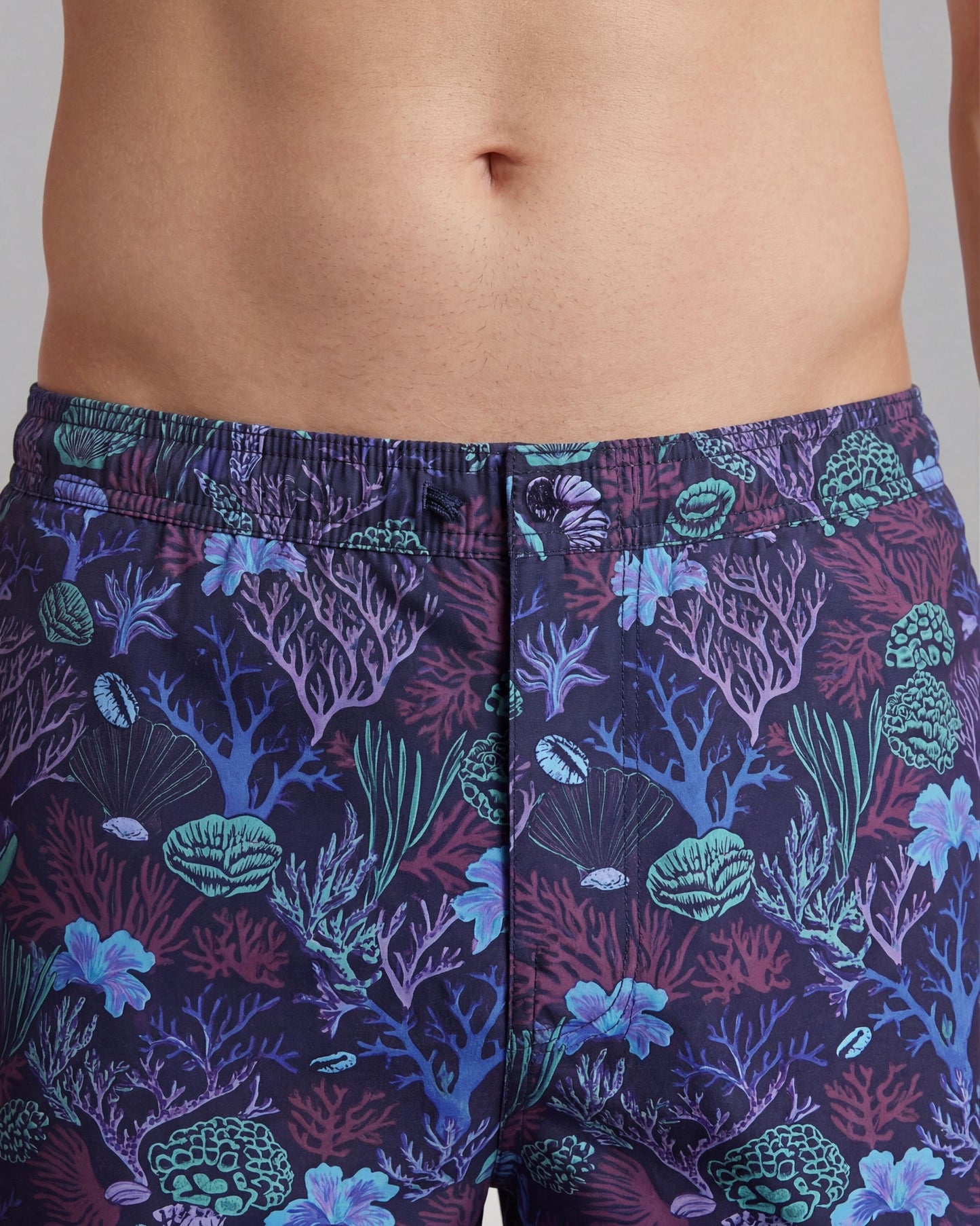 QUACK CORAL GARDEN SWIM SHORT IN PURPLE